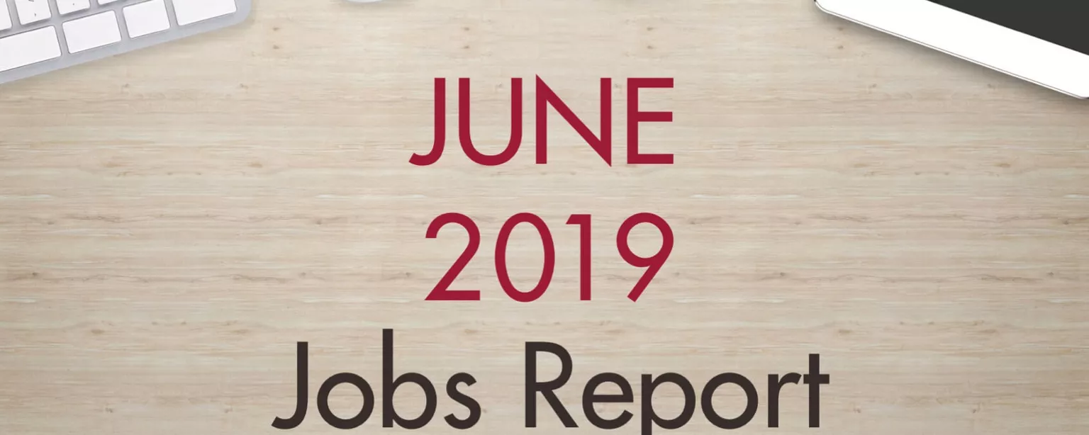 An image of a desk with text that reads, "June 2019 Jobs Report"