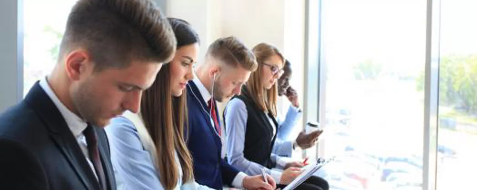 Image of legal industry interviewees waiting in a lobby