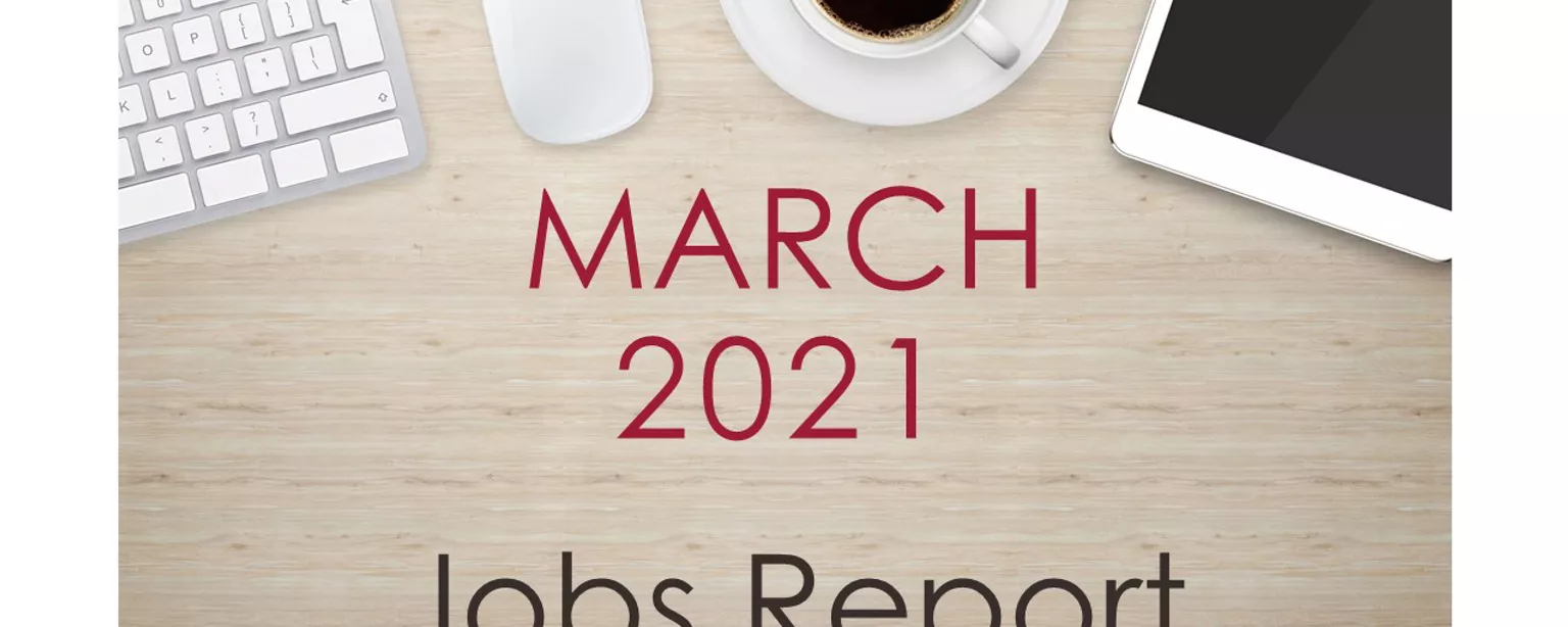 Image of a desk with text that reads, "March 2021 Jobs Report"