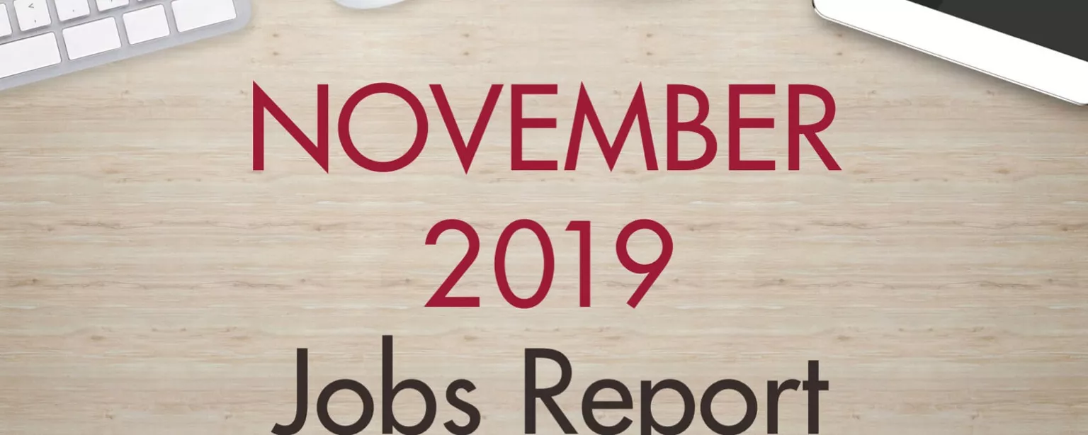 An image of a desk with text that reads, "November 2019 Jobs Report"