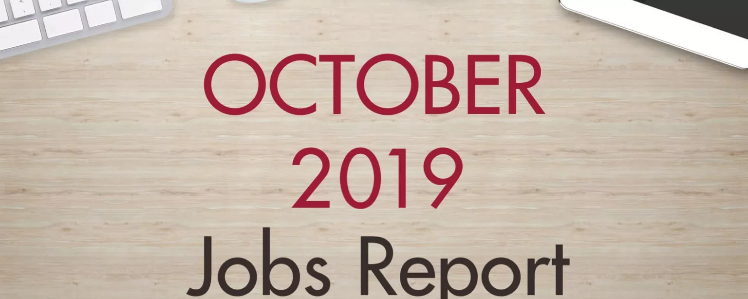 An image of a desk with text that reads, "October 2019 Jobs Report"