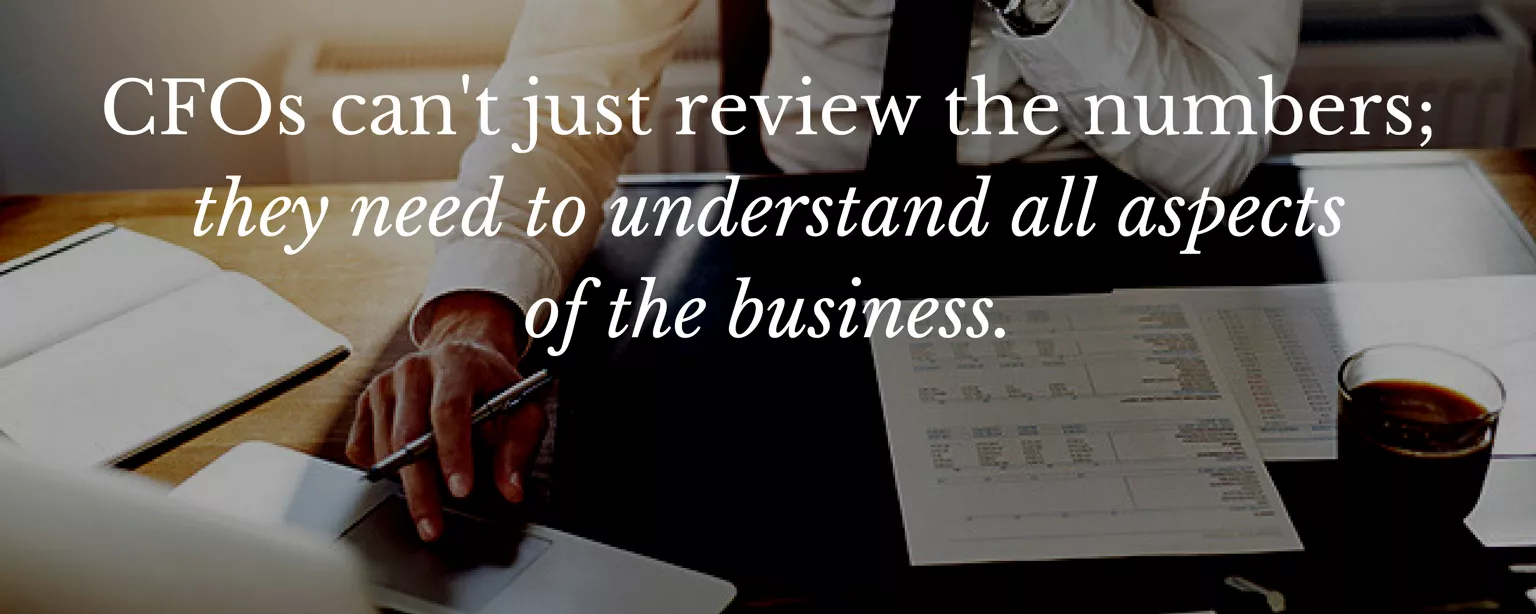 CFO sitting at desk with words: CFOs can't just review the numbers