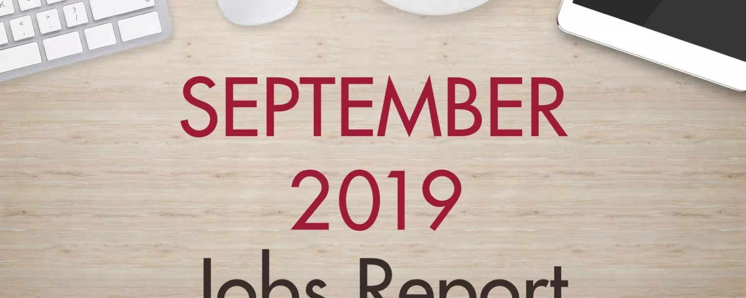 An image of a desk with text that reads, "September 2019 Jobs Report"