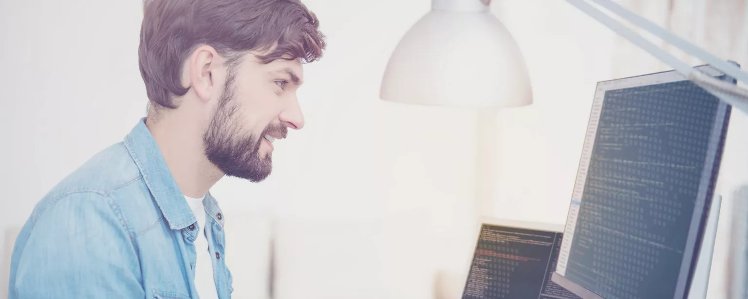 Programmer working at a desk 