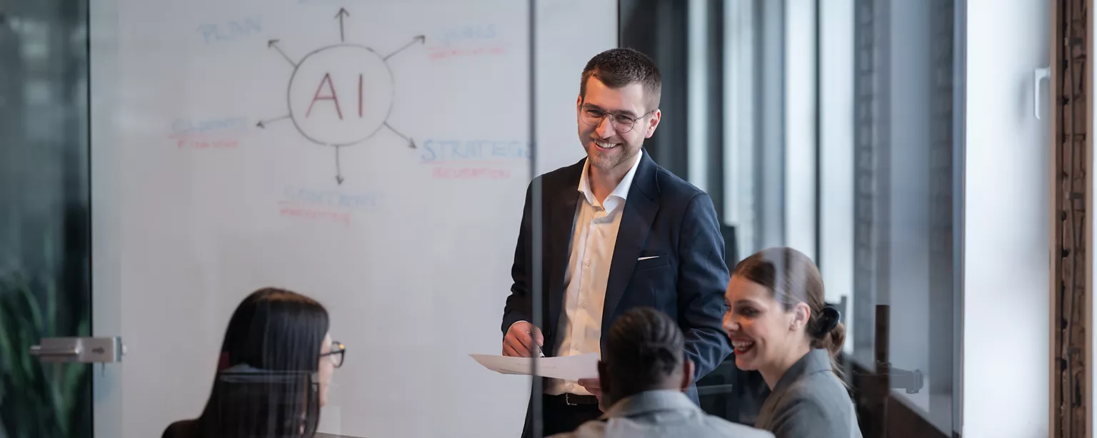 A technology leader addresses a group of business leaders about creating a strong data foundation for an AI project.