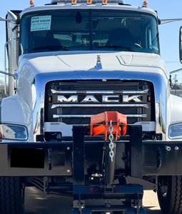 Front view of spreader attached to truck