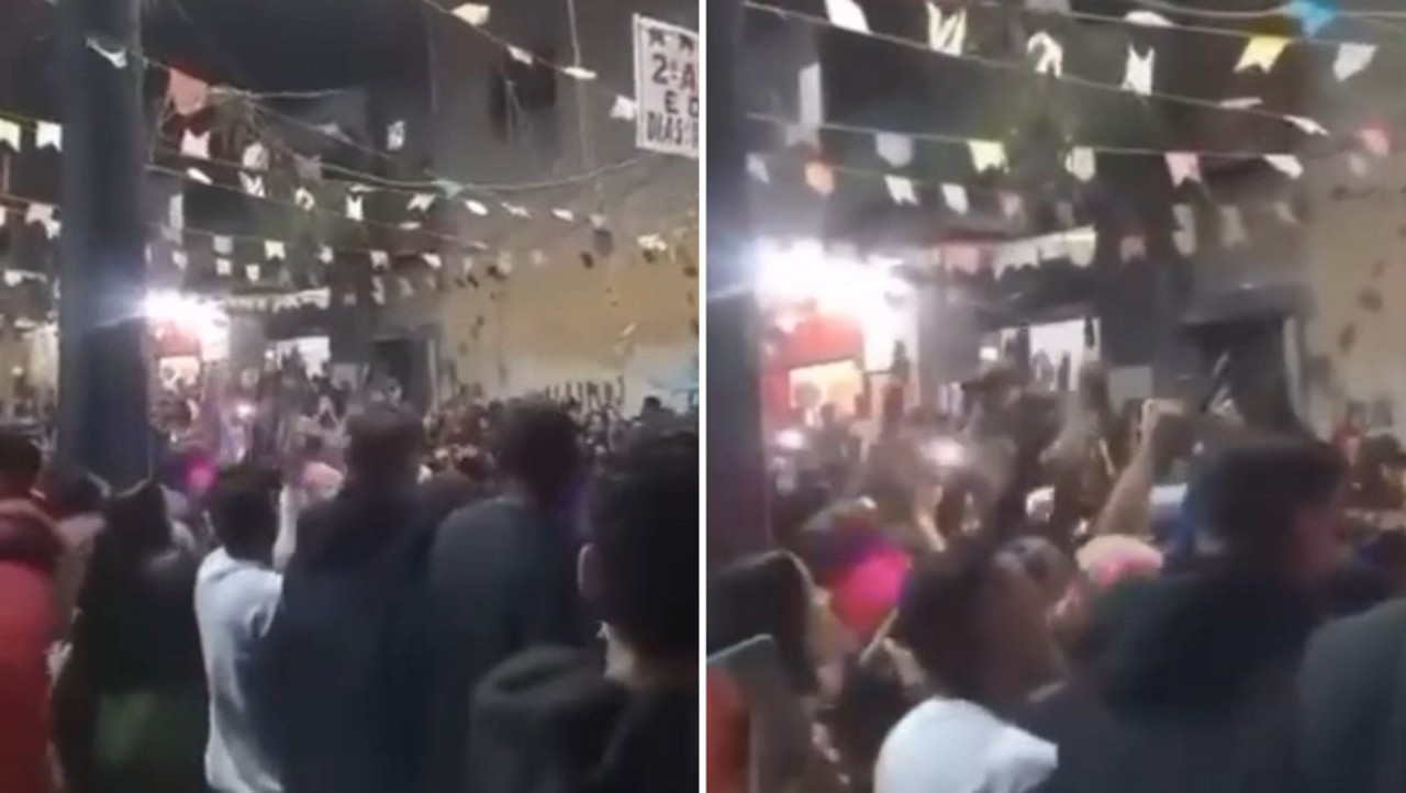 Grupo exibe arma durante arraial em Santa Luzia, na Grande BH 