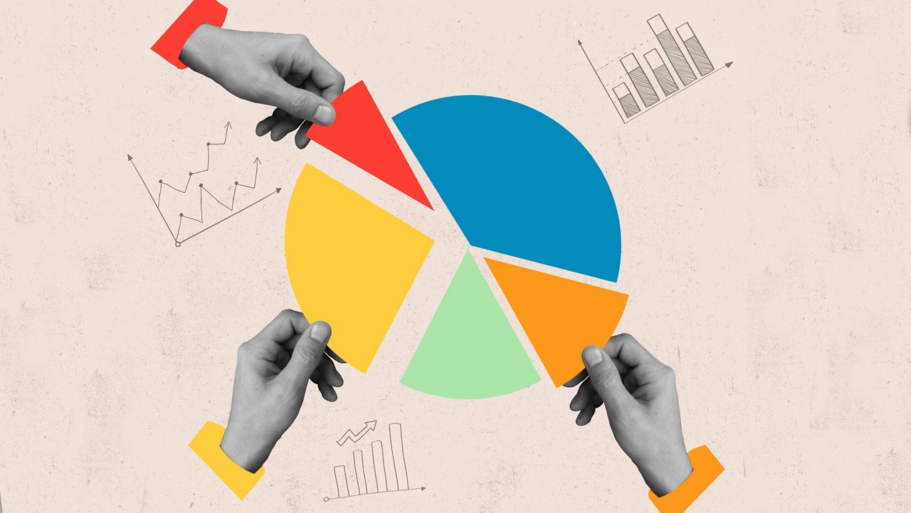 Two hands holding a pie chart.