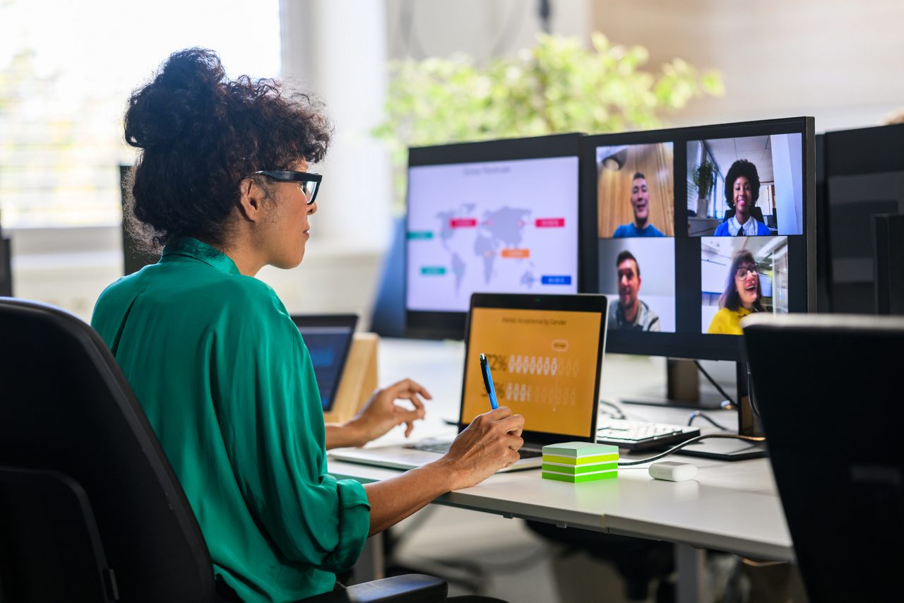 Woman on computer on virtual meeting