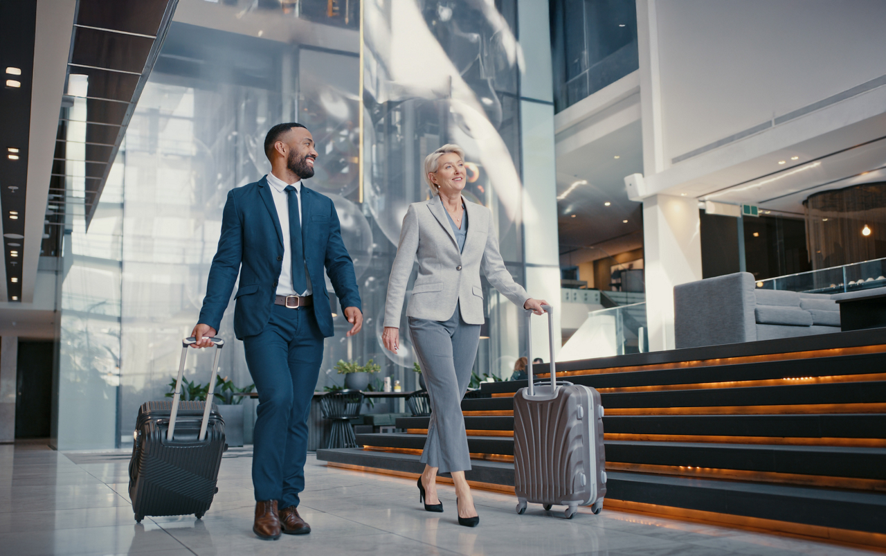 Travel, suitcase or business people in airport for conference, vacation or international work trip with manager. Employees, workers or corporate woman and man walking to airplane, hotel or workshop.
