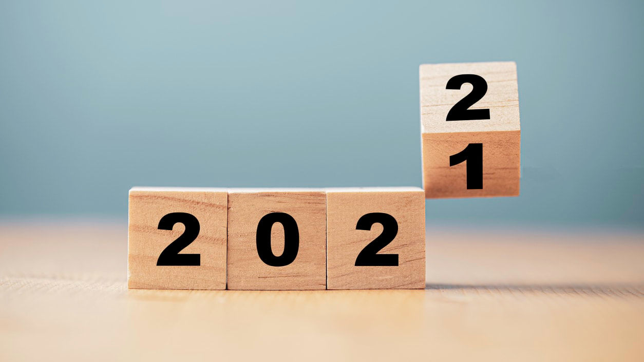 A set of wooden blocks with the number 2021 written on them.