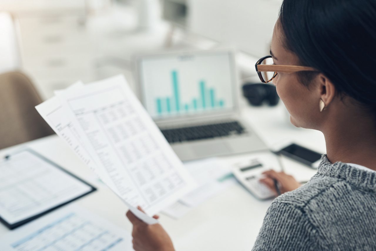 Woman looking at paper work