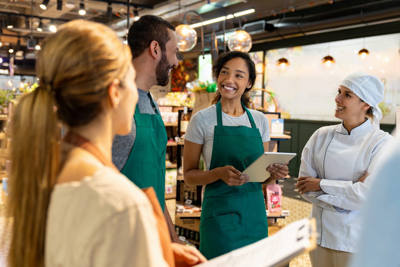 coffee shop workers talking