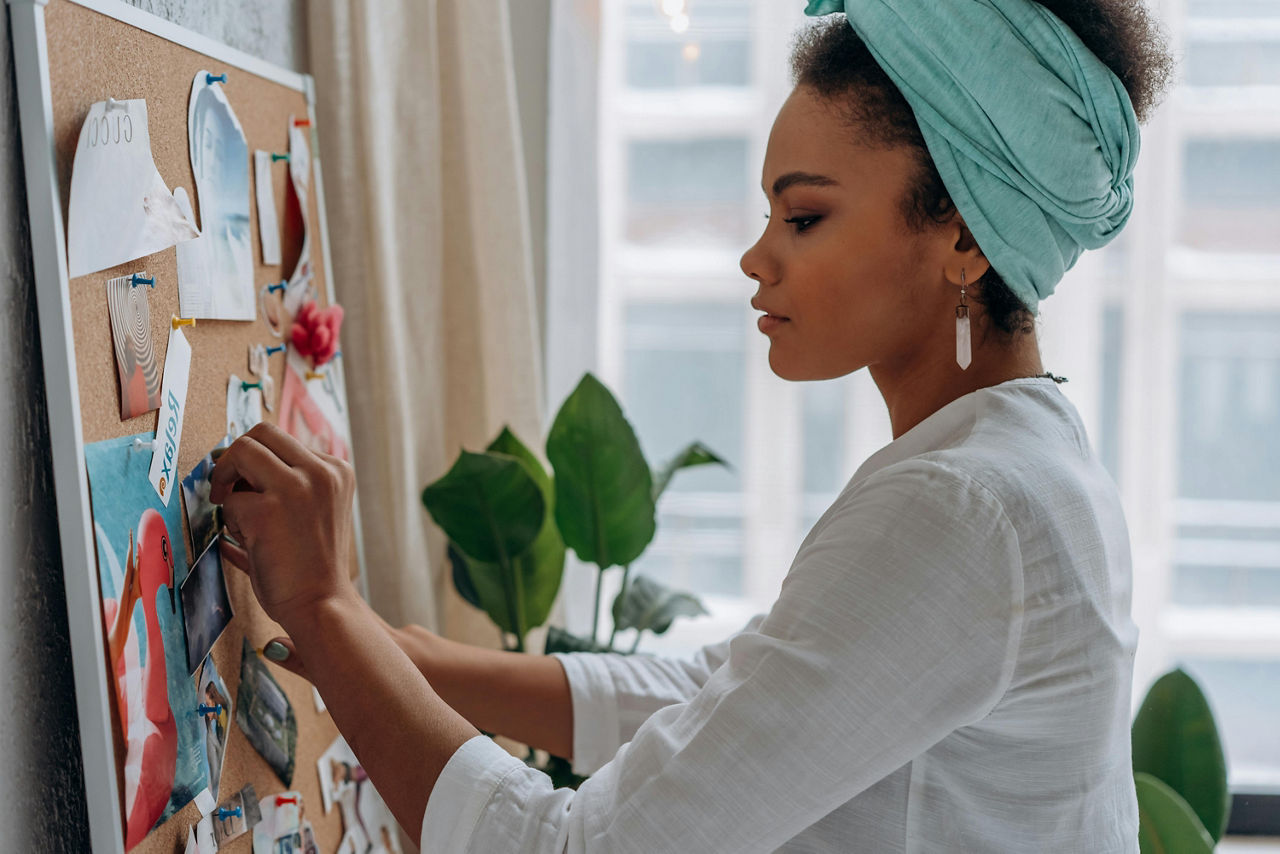 Women working on bulletin board