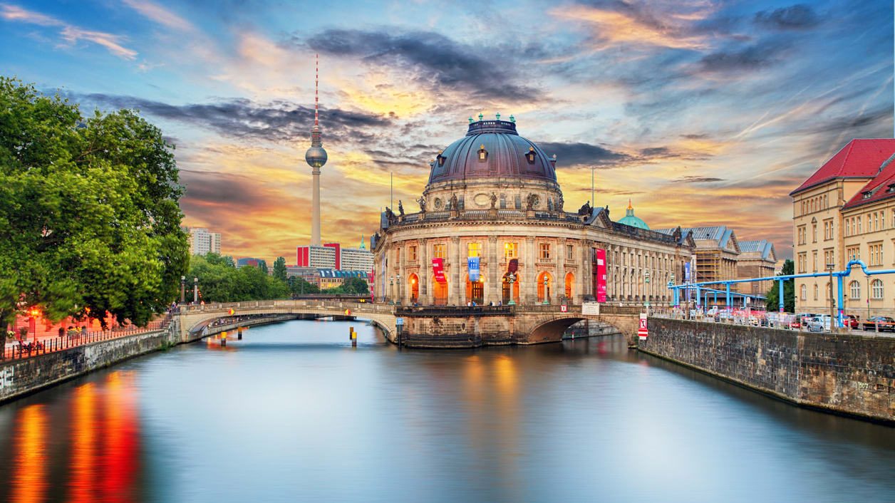 A river with a building in the background.