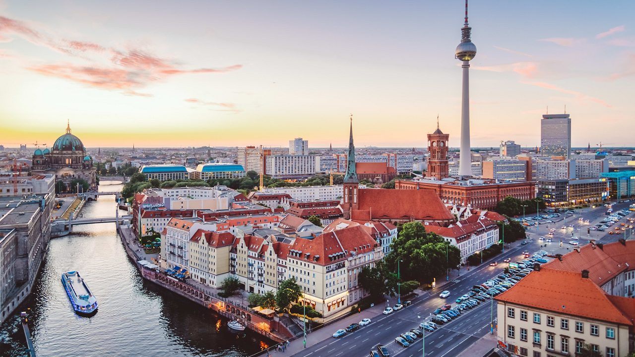 Berlin at sunset with the tv tower in the background.