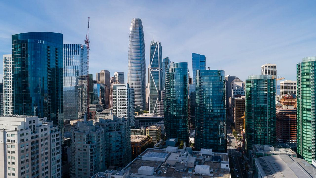 The skyline of a city with many tall buildings.