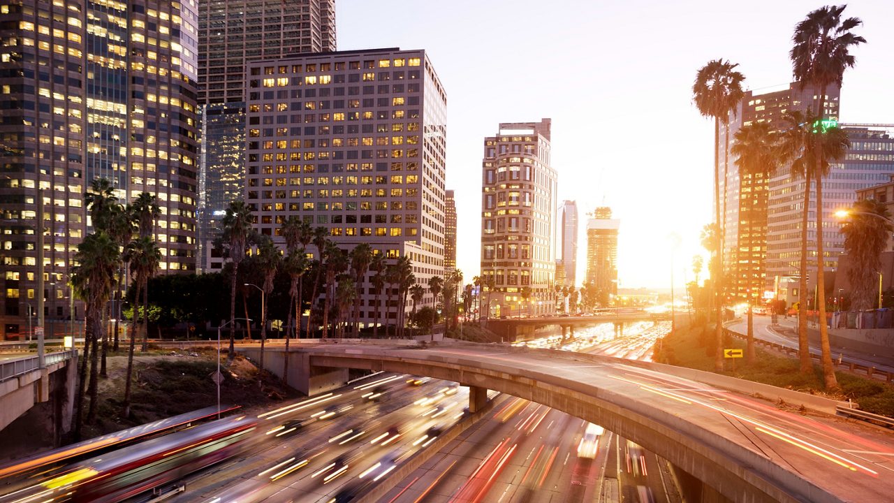 Traffic on a freeway at sunset in los angeles, california.
