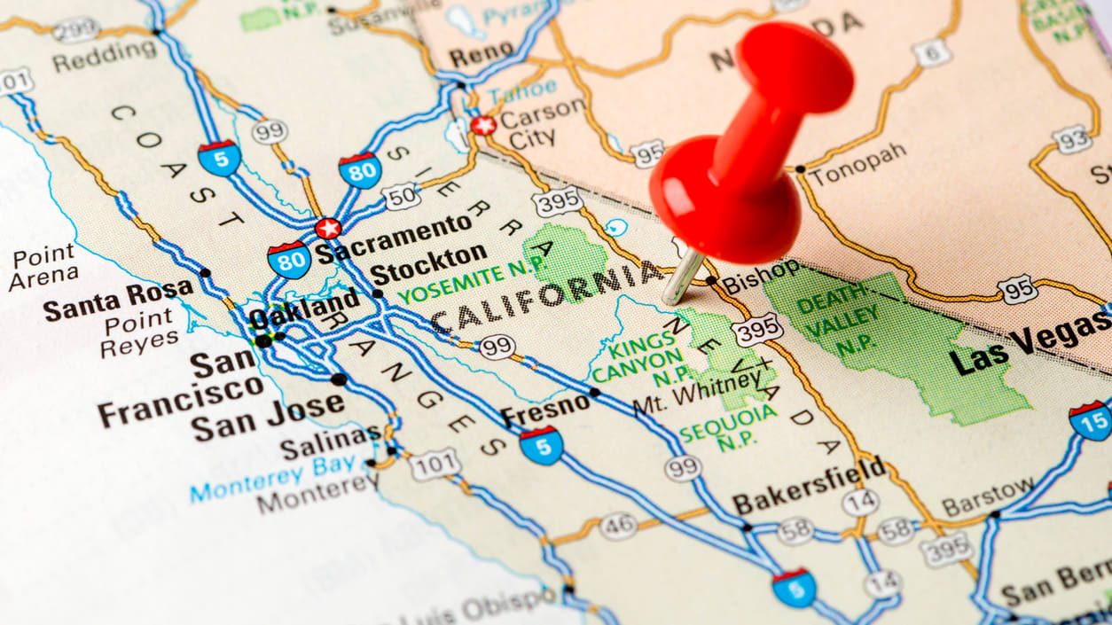 A red pin is pinned on a map of california.