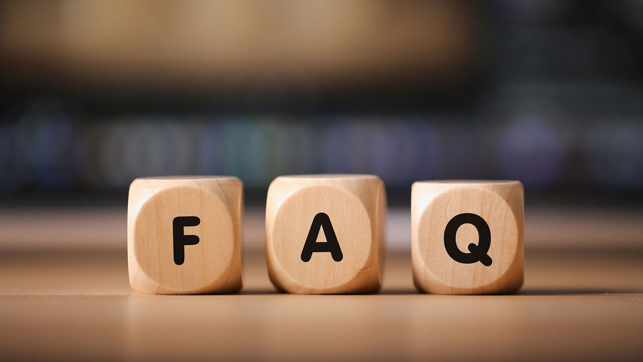 The word faq is written on wooden cubes.