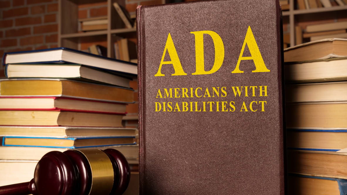 A book with the words ada on top of it.