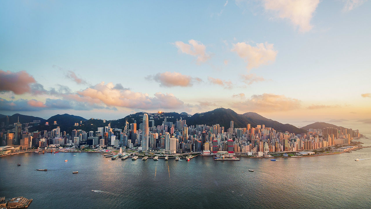 The skyline of hong kong at sunset.