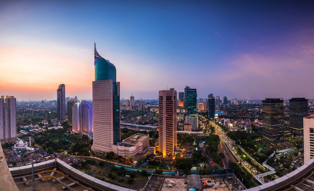 colorfull Jakarta Skyline at dawn with the iconic building. The building is one of the most highest building in Indonesia.
