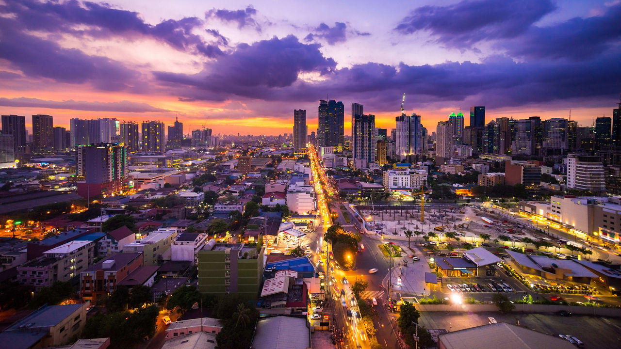 A cityscape at dusk in the philippines.