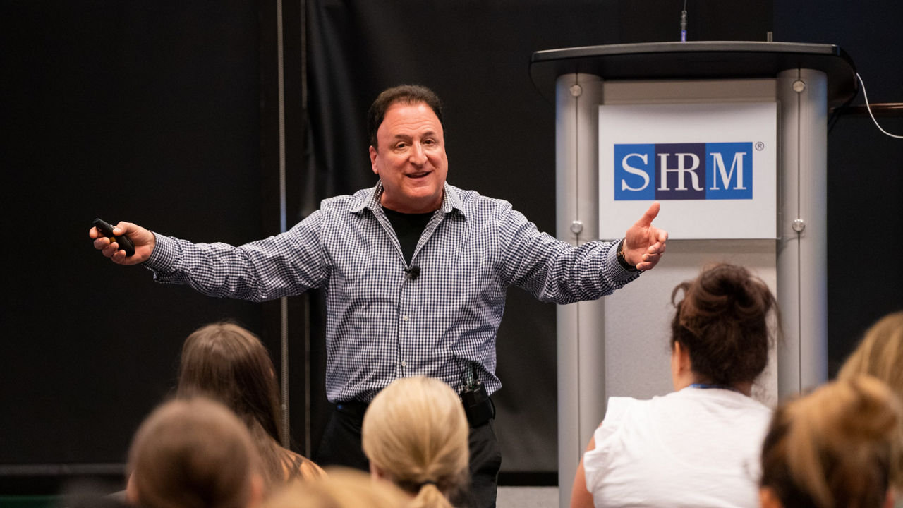 A man giving a presentation to a group of people.
