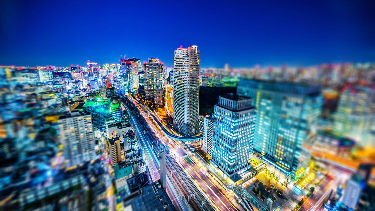A blurry image of a city at night.