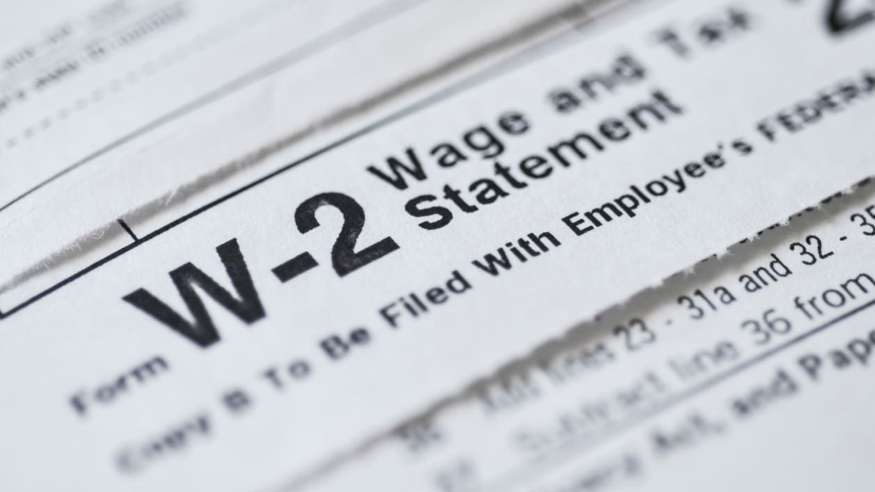 A close up of a w-2 wage statement.