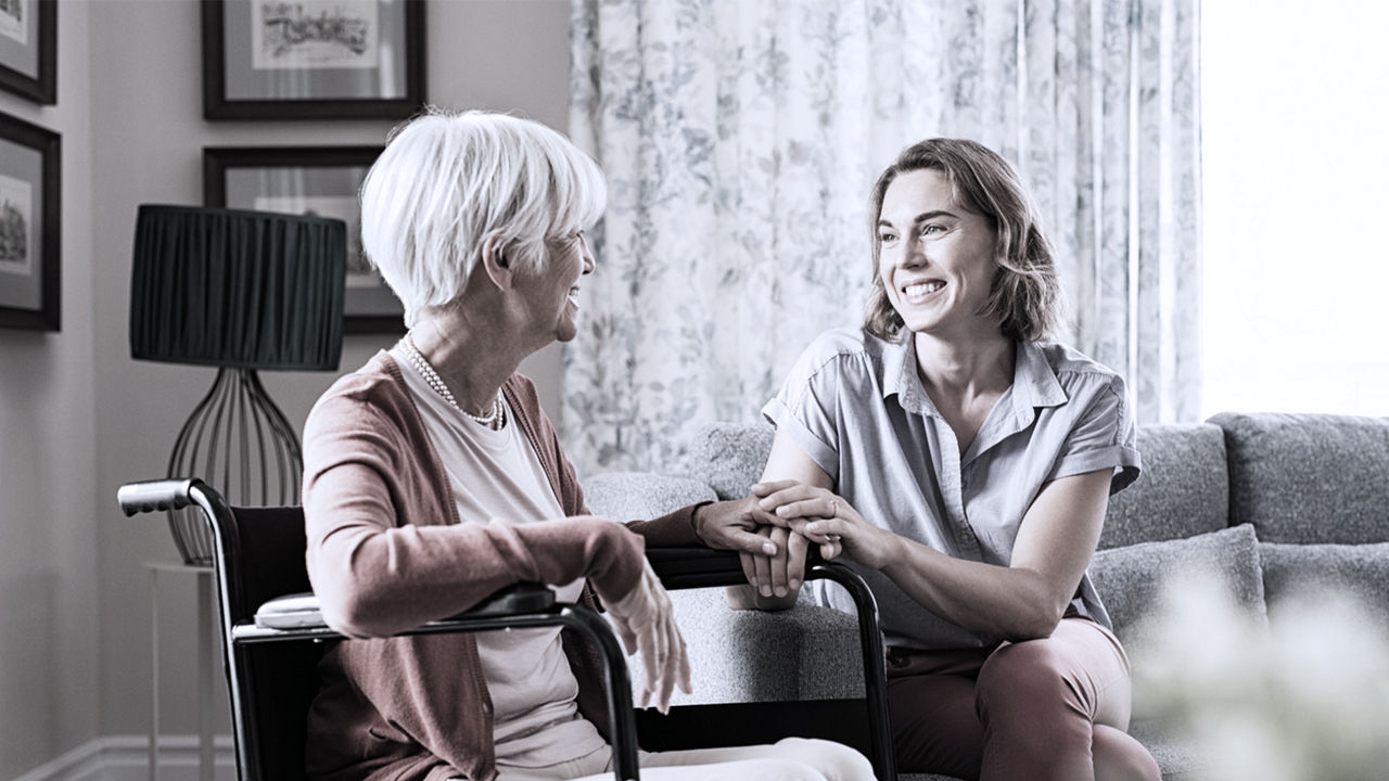 grandma and grand-daughter happily talking