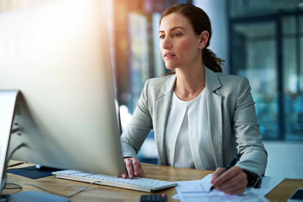 Shot of an attractive businesswoman working behind her computer in the office