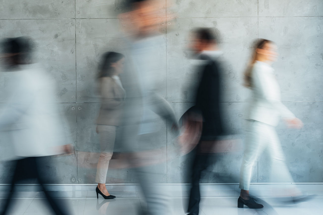 blurred people walking