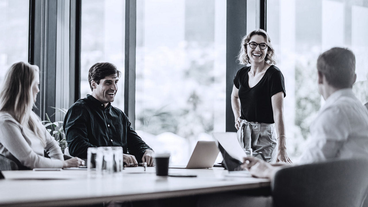 woman leading board meeting photo