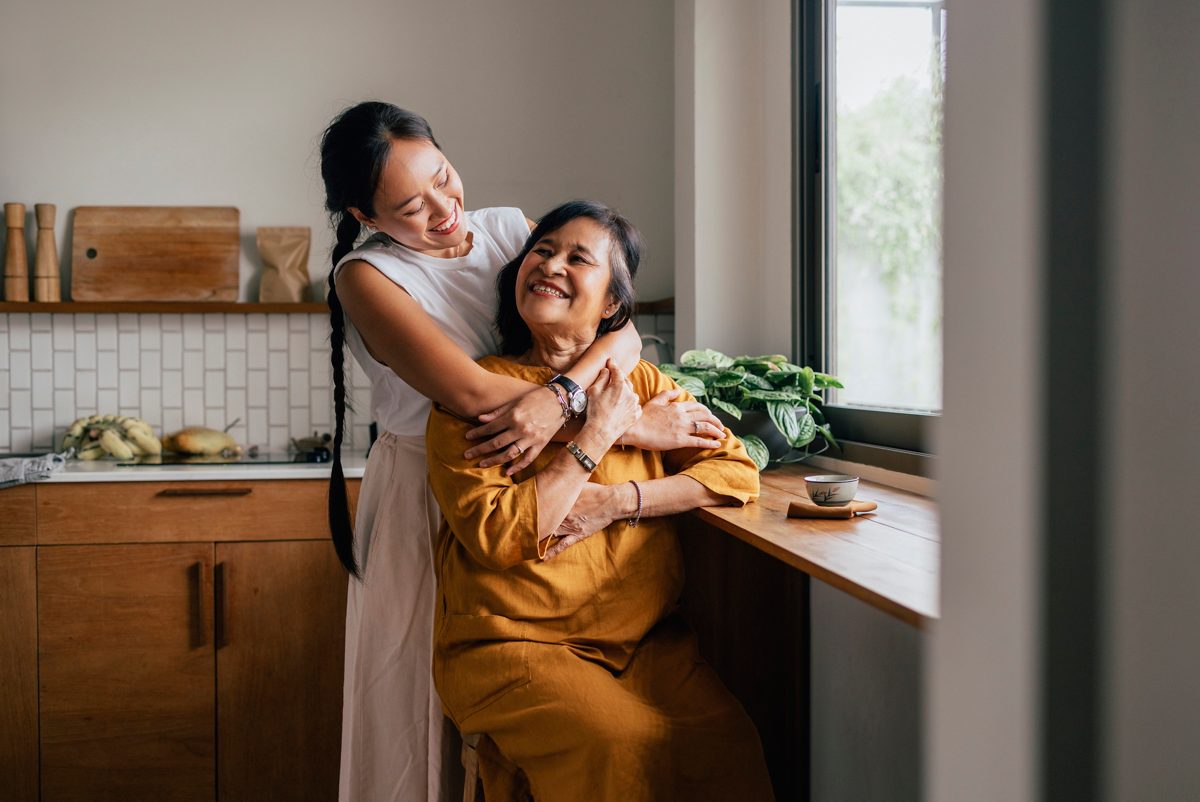 Daughter holding Mother