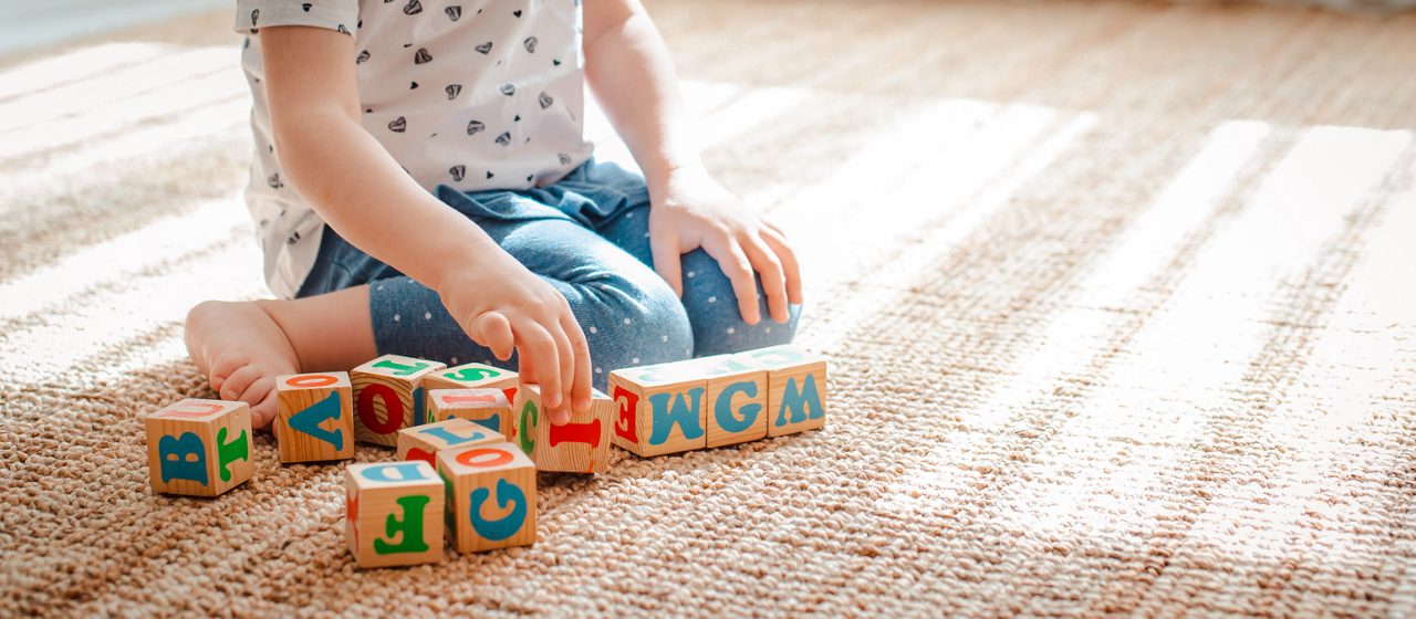 A child playing with building blocks.