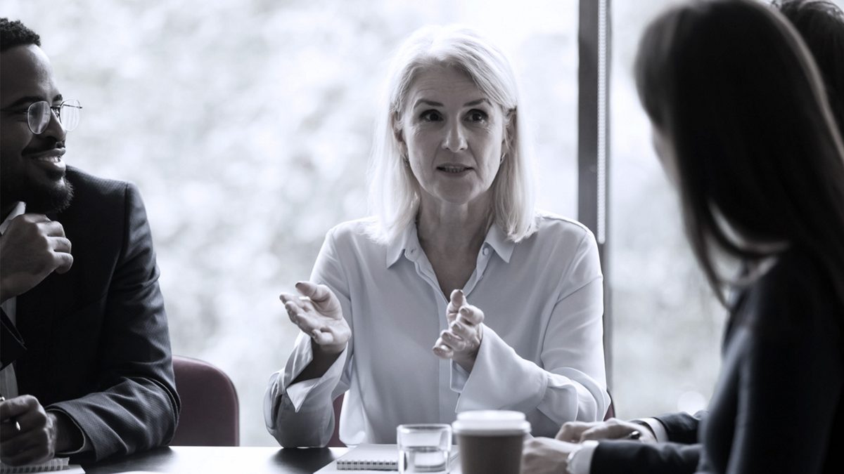 female executive talking to staff