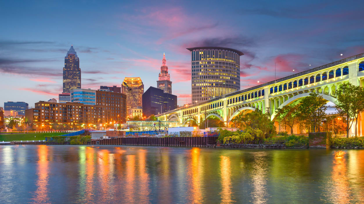 A city skyline at dusk.