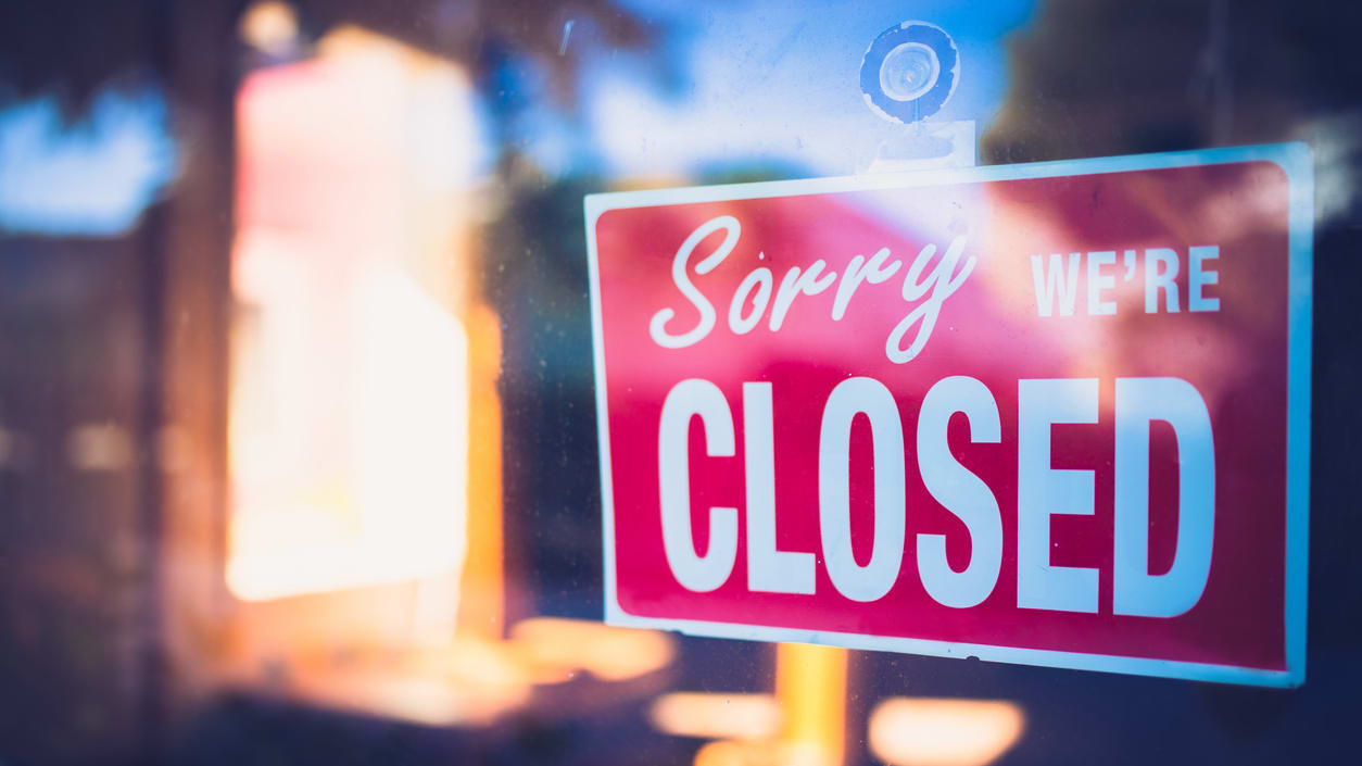 A sign that says sorry we're closed.