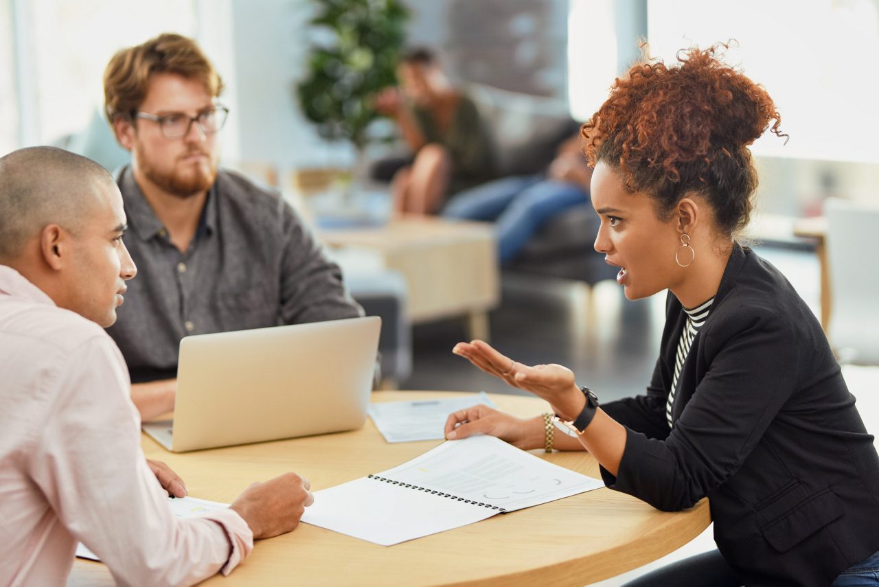 Shot of a group of businesspeople having a meeting in an office