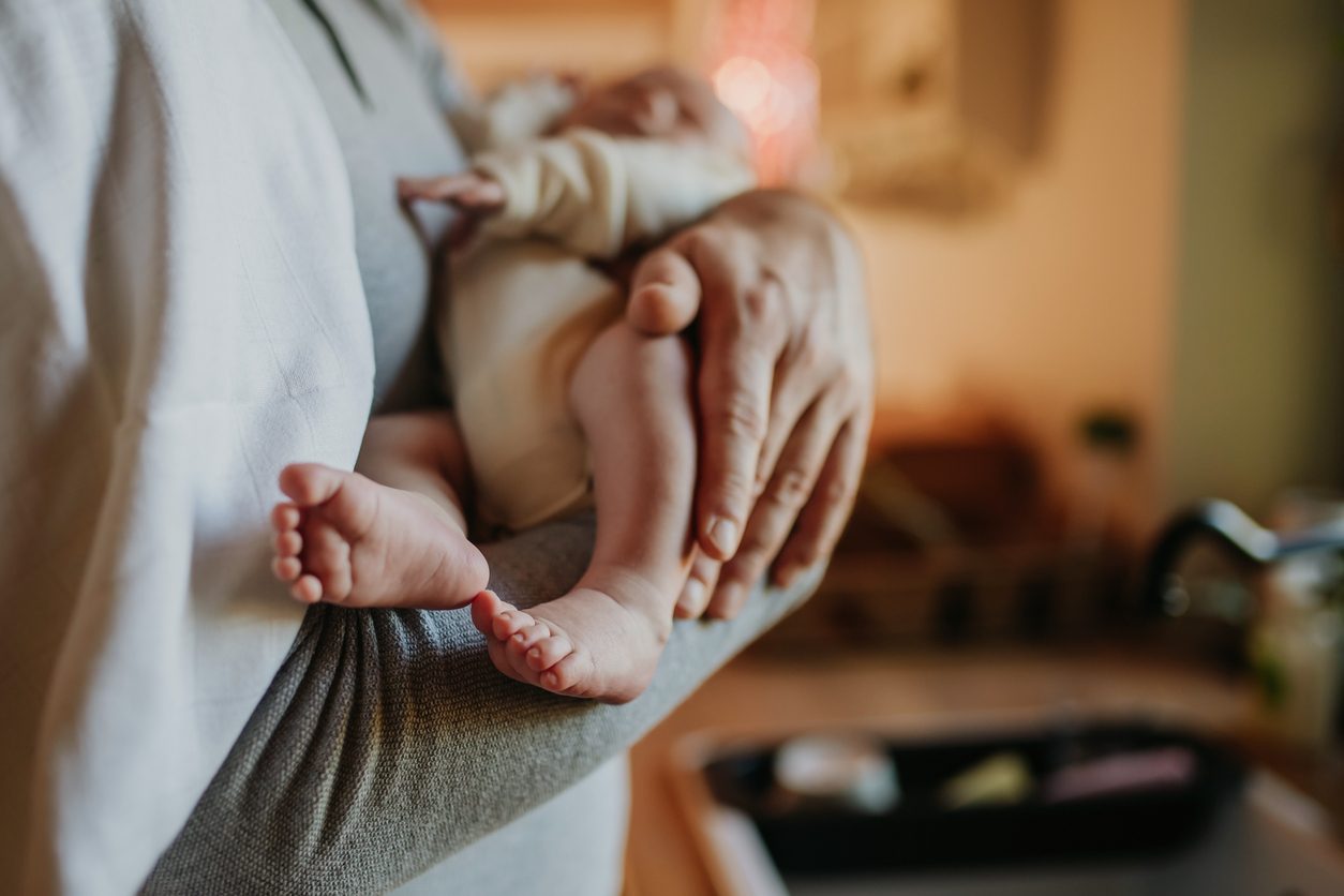 dad holding baby