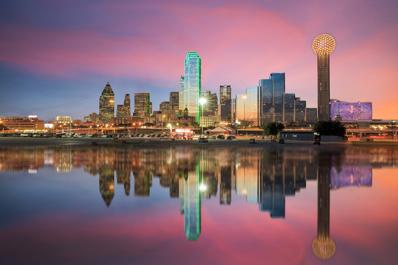 Dallas skyline reflected in Trinity river at sunset, Texas
