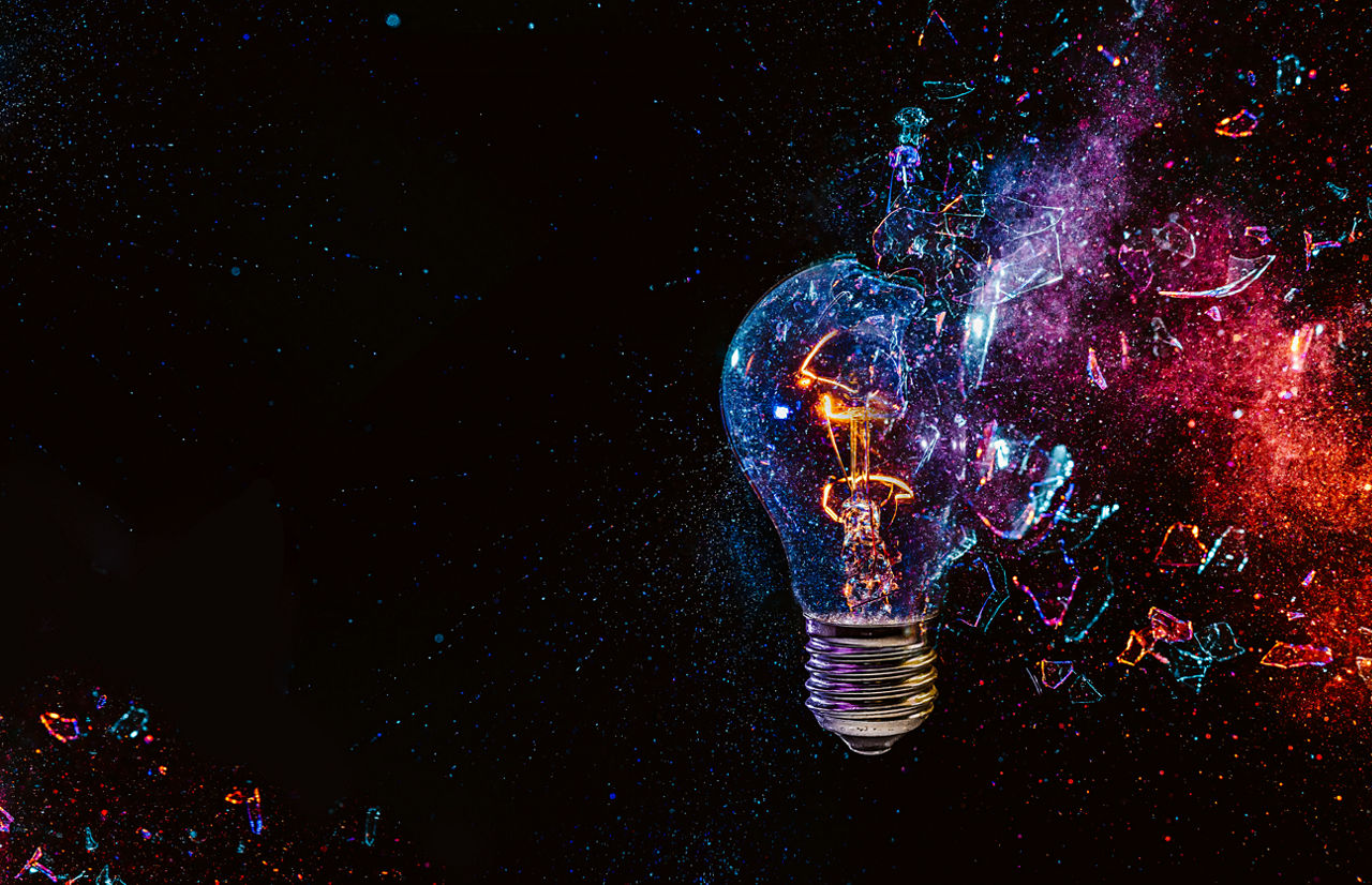 image of colorful exploding light bulb