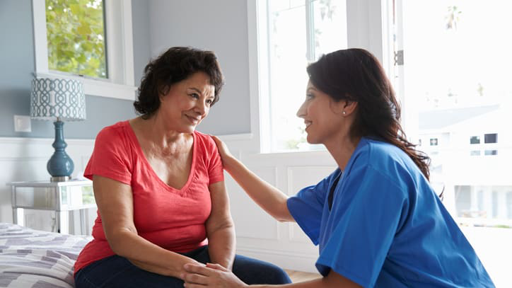 Healthcare worker giving patient care