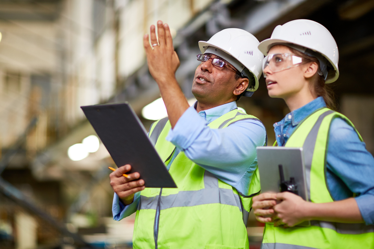 Engineer showing the project to his colleague