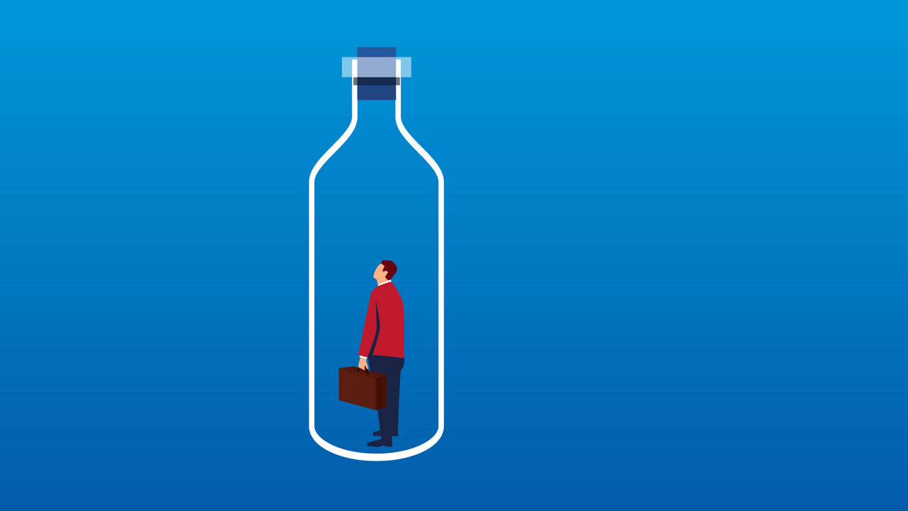 A man in a bottle with a briefcase.
