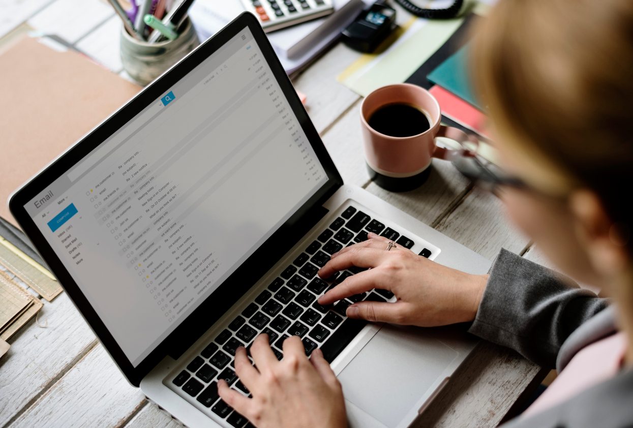 worker looking at their company email