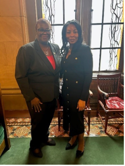 Emily M. Dickens with State Senate Member