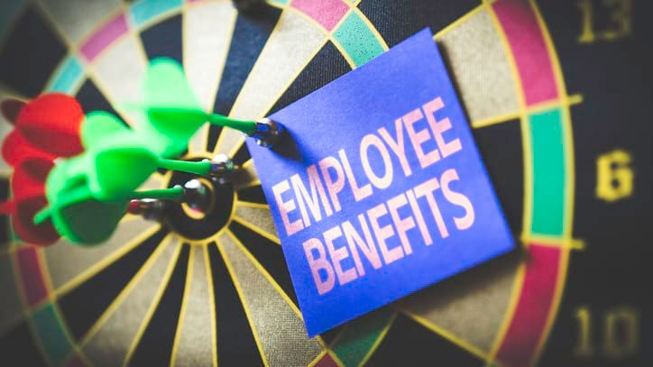 Employee benefits on a dart board.